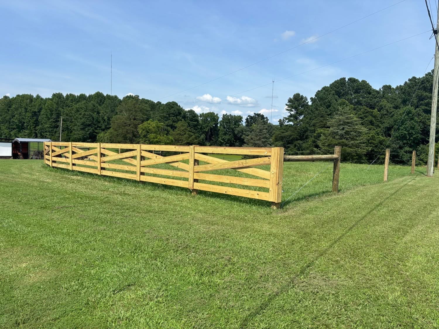 Crossbuck estate wood fence installation